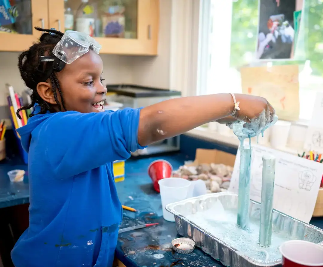 King School student conducting a science experiment